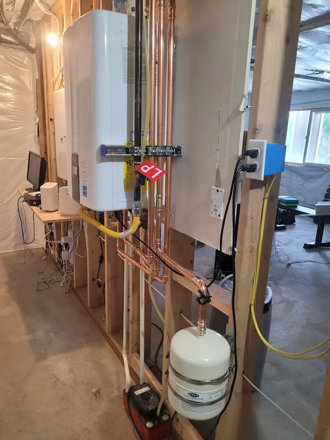 Licensed plumber repairing a kitchen sink in Holden