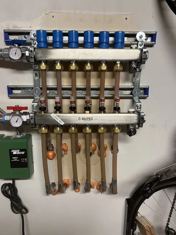 Plumber performing Water Heater Repair at a residential property in Holden